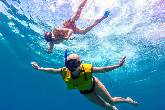 ATV Mud Kicking and Snorkeling by Boat in Cozumel - Lunch, Open Bar, and Water Park Time