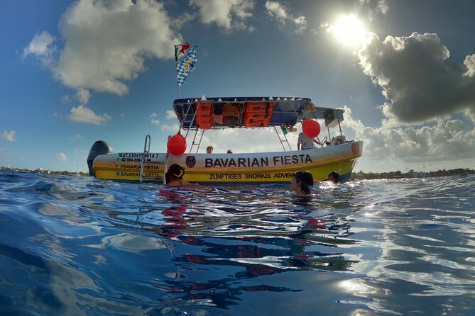 Bavarian Fiesta Snorkel Activity in Glass Bottom Boat at San Miguel de Cozumel - Snacks, fruit, margaritas, and the Bavarian option