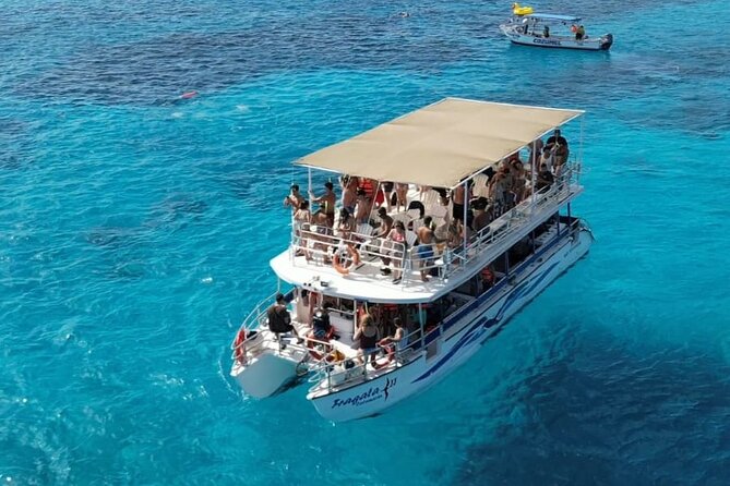 Catamaran in Cozumel with snorkeling at El Cielo and open Bar - First water stop: 35 minutes at the reef