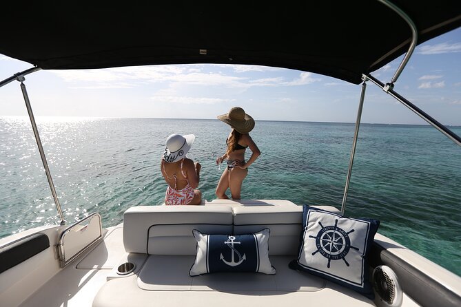 Cozumel Heaven awaits: Sail and Snorkel by private boat - Eating from a floating basket