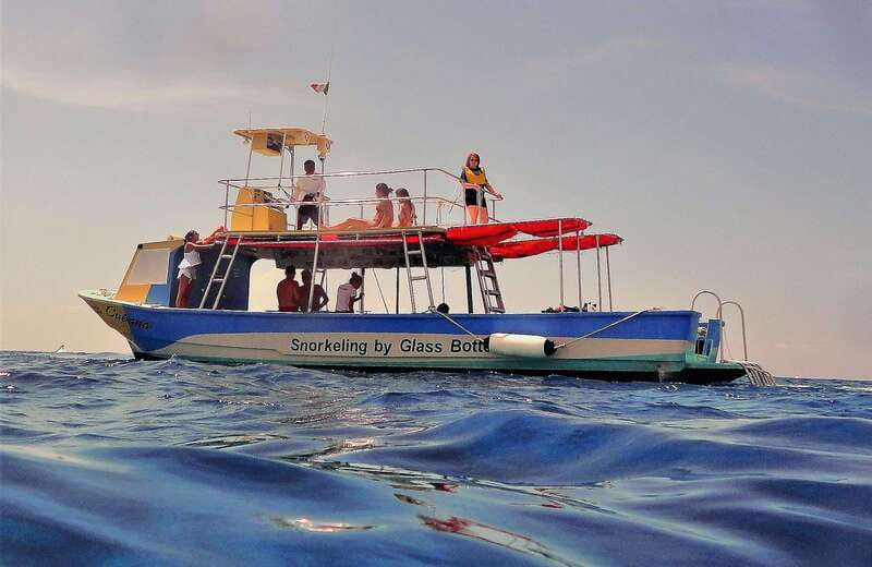 Cozumel: VIP Glass Bottom Boat & Snorkeling 3 Reefs Tour - A glass-bottom boat that includes the whole family
