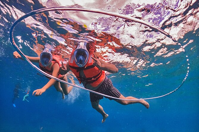 Crystal Boat Tour with Snorkeling and Drinks in Cozumel - Snorkeling equipment and onboard drinks