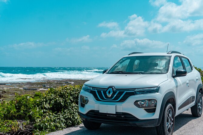 Electric Island Tour with Snorkeling, Lunch & Otoch Mayan Experience - Driving your own electric car around Cozumel