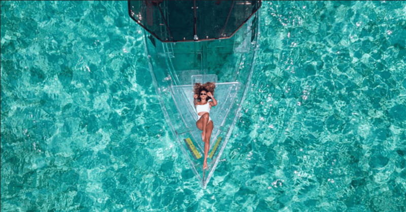 Explore the sea of cozumel in a transprent boat with drinks and snorkel. - Key points to know before you book