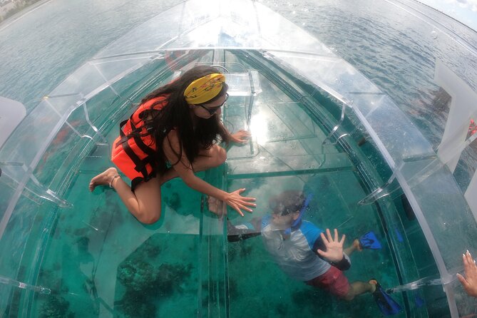 Invisible Boat Snorkeling Tour - Looking through Cozumel’s clear hull