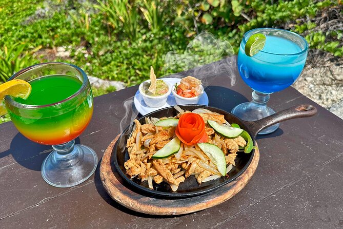 Jeep Tour of Cozumel with Lunch and Beach Club - Climbing the rocks at El Mirador