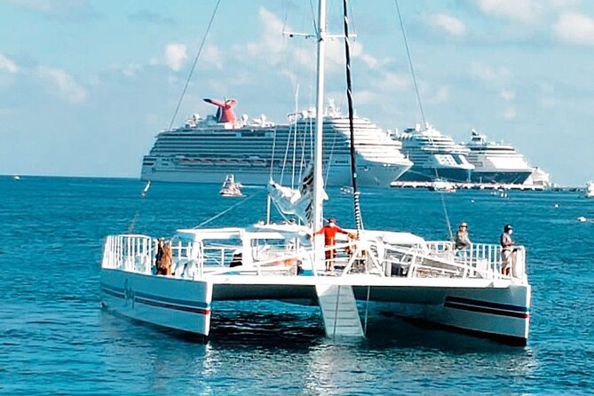 Luxury Cozumel Catamaran: Snorkel, Beach Club & Relaxation - Fury Beach Club shifts the pace