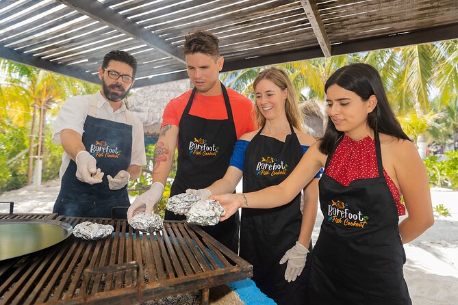 Tikinxic Barefoot Fish Guided Cookout Experience in Cozumel - Cooking Tikinxic fish at Barracuda Beach Club