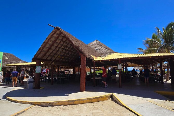 Tour in the Village Shopping and Beach Time in Cozumel - Two hours at a private beach club