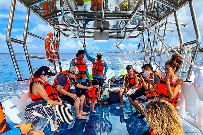 Transparent Boating and Snorkeling Tour in Cozumel All Inclusive - A clear-water boat ride with a useful twist