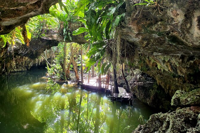 Wild Jade Cavern ATV Tour With Transfer - Entering Jade Cavern and seeing Chempita cenote
